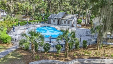 First-floor coastal retreat with vast lagoon views from all on Shipyard Golf Club in South Carolina - for sale on GolfHomes.com, golf home, golf lot