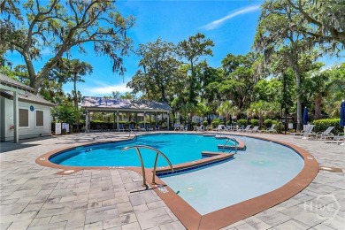 First-floor coastal retreat with vast lagoon views from all on Shipyard Golf Club in South Carolina - for sale on GolfHomes.com, golf home, golf lot