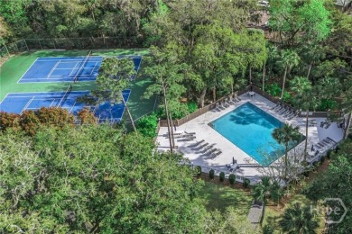 First-floor coastal retreat with vast lagoon views from all on Shipyard Golf Club in South Carolina - for sale on GolfHomes.com, golf home, golf lot