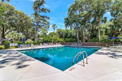 First-floor coastal retreat with vast lagoon views from all on Shipyard Golf Club in South Carolina - for sale on GolfHomes.com, golf home, golf lot