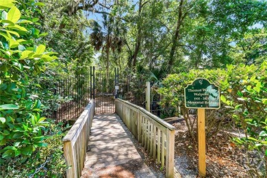 First-floor coastal retreat with vast lagoon views from all on Shipyard Golf Club in South Carolina - for sale on GolfHomes.com, golf home, golf lot
