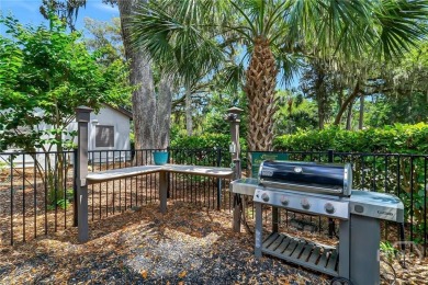 First-floor coastal retreat with vast lagoon views from all on Shipyard Golf Club in South Carolina - for sale on GolfHomes.com, golf home, golf lot