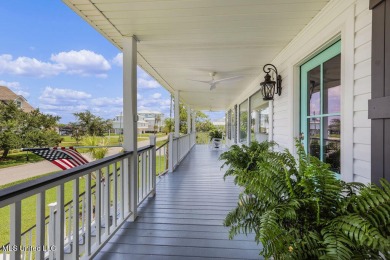 Welcome to 129 Sweet Bay Dr., a stunning coastal retreat nestled on Pass Christian Isles Golf Club in Mississippi - for sale on GolfHomes.com, golf home, golf lot