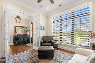 Step into a residence where sophistication meets serenity. This on Rarity Bay Country Club - Loudon in Tennessee - for sale on GolfHomes.com, golf home, golf lot