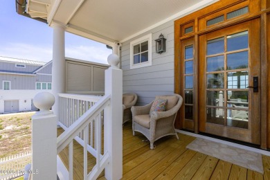 This exceptional oceanfront home in Roosevelt Beach showcases on The Country Club of the Crystal Coast in North Carolina - for sale on GolfHomes.com, golf home, golf lot