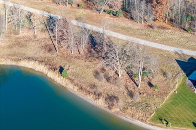 Lakefront lots will soon be a thing of the past at this pace on Tullymore Golf Club in Michigan - for sale on GolfHomes.com, golf home, golf lot