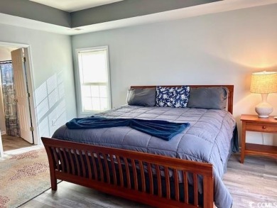Motivated Sellers! Wake up to breathtaking sunrises and unwind on International Club of Myrtle Beach in South Carolina - for sale on GolfHomes.com, golf home, golf lot