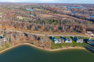 Lakefront lots will soon be a thing of the past at this pace on Tullymore Golf Club in Michigan - for sale on GolfHomes.com, golf home, golf lot