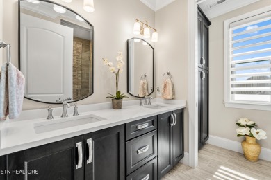 Step into a residence where sophistication meets serenity. This on Rarity Bay Country Club - Loudon in Tennessee - for sale on GolfHomes.com, golf home, golf lot
