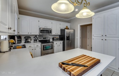 Pristine home in the heart of Castlewoods, at 213 Boxwood Circle on Castlewoods Golf Club in Mississippi - for sale on GolfHomes.com, golf home, golf lot