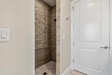 Step into a residence where sophistication meets serenity. This on Rarity Bay Country Club - Loudon in Tennessee - for sale on GolfHomes.com, golf home, golf lot