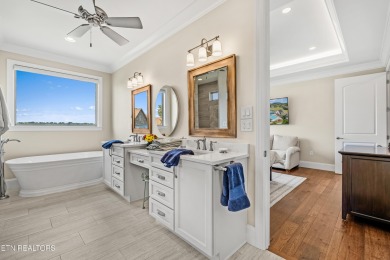 Step into a residence where sophistication meets serenity. This on Rarity Bay Country Club - Loudon in Tennessee - for sale on GolfHomes.com, golf home, golf lot