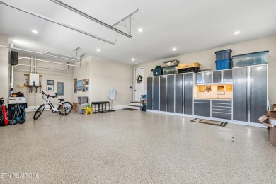 Step into a residence where sophistication meets serenity. This on Rarity Bay Country Club - Loudon in Tennessee - for sale on GolfHomes.com, golf home, golf lot