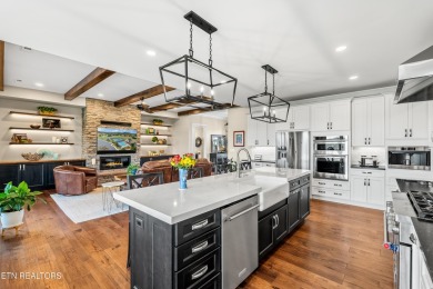 Step into a residence where sophistication meets serenity. This on Rarity Bay Country Club - Loudon in Tennessee - for sale on GolfHomes.com, golf home, golf lot