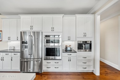 Step into a residence where sophistication meets serenity. This on Rarity Bay Country Club - Loudon in Tennessee - for sale on GolfHomes.com, golf home, golf lot