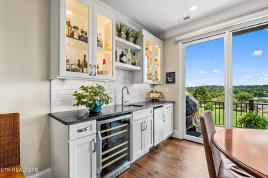 Step into a residence where sophistication meets serenity. This on Rarity Bay Country Club - Loudon in Tennessee - for sale on GolfHomes.com, golf home, golf lot