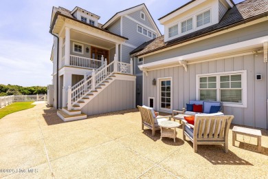 This exceptional oceanfront home in Roosevelt Beach showcases on The Country Club of the Crystal Coast in North Carolina - for sale on GolfHomes.com, golf home, golf lot