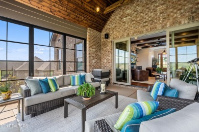 Step into a residence where sophistication meets serenity. This on Rarity Bay Country Club - Loudon in Tennessee - for sale on GolfHomes.com, golf home, golf lot