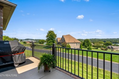 Step into a residence where sophistication meets serenity. This on Rarity Bay Country Club - Loudon in Tennessee - for sale on GolfHomes.com, golf home, golf lot