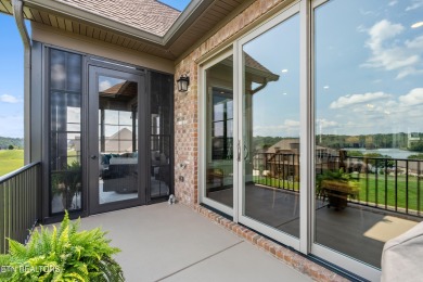 Step into a residence where sophistication meets serenity. This on Rarity Bay Country Club - Loudon in Tennessee - for sale on GolfHomes.com, golf home, golf lot