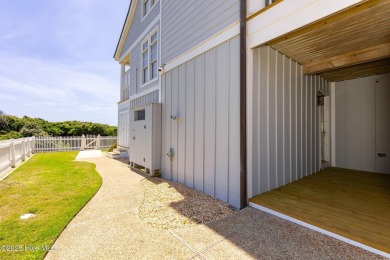 This exceptional oceanfront home in Roosevelt Beach showcases on The Country Club of the Crystal Coast in North Carolina - for sale on GolfHomes.com, golf home, golf lot