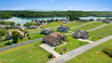 Step into a residence where sophistication meets serenity. This on Rarity Bay Country Club - Loudon in Tennessee - for sale on GolfHomes.com, golf home, golf lot
