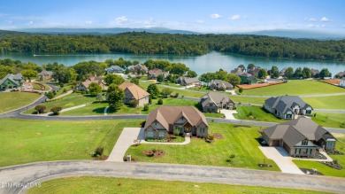 Step into a residence where sophistication meets serenity. This on Rarity Bay Country Club - Loudon in Tennessee - for sale on GolfHomes.com, golf home, golf lot