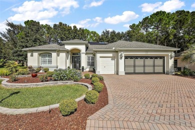 Welcome to This Elegant Hampton Model nestled in a cul-de-sac on on Eagle Ridge At Spruce Creek Country Club in Florida - for sale on GolfHomes.com, golf home, golf lot