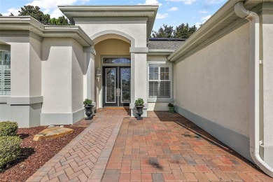 Welcome to This Elegant Hampton Model nestled in a cul-de-sac on on Eagle Ridge At Spruce Creek Country Club in Florida - for sale on GolfHomes.com, golf home, golf lot