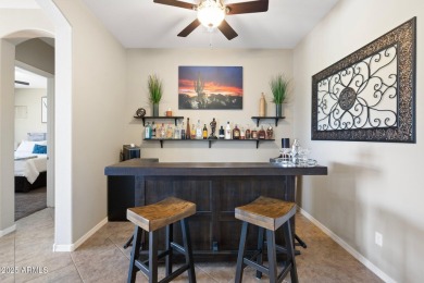 This stunning oasis is located on the 16th hole in Estrella's on Estrella Mountain Ranch Golf Course in Arizona - for sale on GolfHomes.com, golf home, golf lot