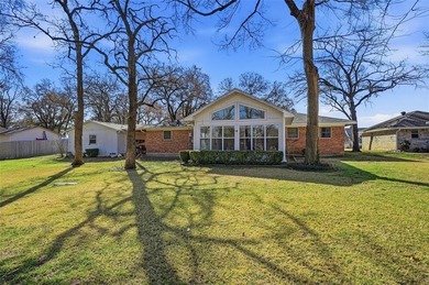 Great potential in this three-bedroom, two-bath golf course on Lake Kiowa Golf Course in Texas - for sale on GolfHomes.com, golf home, golf lot