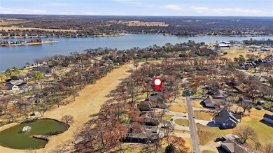 Great potential in this three-bedroom, two-bath golf course on Lake Kiowa Golf Course in Texas - for sale on GolfHomes.com, golf home, golf lot