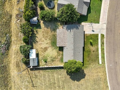 Welcome home to this charming 3-bedroom, 2-bath property on Sunset Hills Golf Course in Oklahoma - for sale on GolfHomes.com, golf home, golf lot