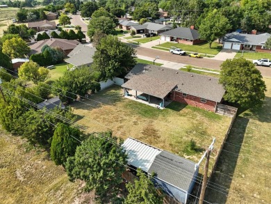 Welcome home to this charming 3-bedroom, 2-bath property on Sunset Hills Golf Course in Oklahoma - for sale on GolfHomes.com, golf home, golf lot