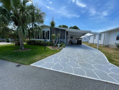 You won't find a better-maintained home than this beautifully on Lakes at Leesburg Golf Course in Florida - for sale on GolfHomes.com, golf home, golf lot