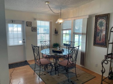 You won't find a better-maintained home than this beautifully on Lakes at Leesburg Golf Course in Florida - for sale on GolfHomes.com, golf home, golf lot