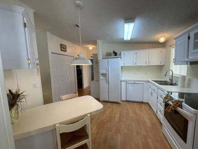 You won't find a better-maintained home than this beautifully on Lakes at Leesburg Golf Course in Florida - for sale on GolfHomes.com, golf home, golf lot