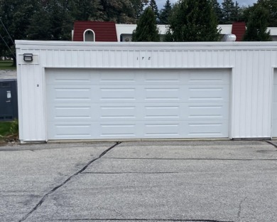 Spacious 2 bedroom end condo with beautiful view overlooking on Swan Valley Golf Club in Michigan - for sale on GolfHomes.com, golf home, golf lot