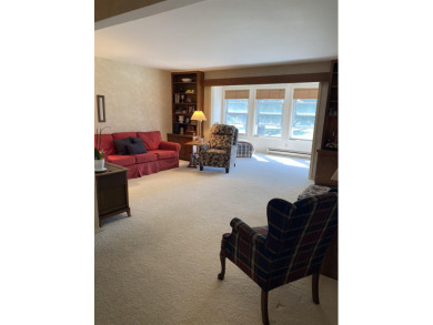 Spacious 2 bedroom end condo with beautiful view overlooking on Swan Valley Golf Club in Michigan - for sale on GolfHomes.com, golf home, golf lot