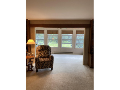 Spacious 2 bedroom end condo with beautiful view overlooking on Swan Valley Golf Club in Michigan - for sale on GolfHomes.com, golf home, golf lot