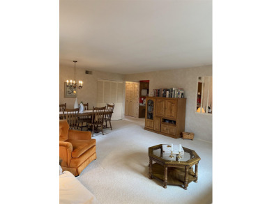 Spacious 2 bedroom end condo with beautiful view overlooking on Swan Valley Golf Club in Michigan - for sale on GolfHomes.com, golf home, golf lot