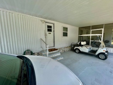 Welcome home to this 1994 single wide manufactured home, which on Golden Lakes Golf Course in Florida - for sale on GolfHomes.com, golf home, golf lot