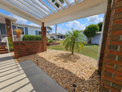 This lovely home is located in North Fort Myers Florida! Pine on Pine Lakes Country Club in Florida - for sale on GolfHomes.com, golf home, golf lot