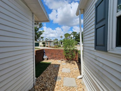 This lovely home is located in North Fort Myers Florida! Pine on Pine Lakes Country Club in Florida - for sale on GolfHomes.com, golf home, golf lot