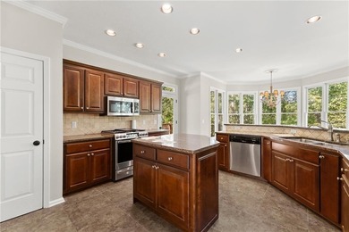 Beautifully situated on a private golf course lot, this stunning on Trophy Club of Apalachee in Georgia - for sale on GolfHomes.com, golf home, golf lot