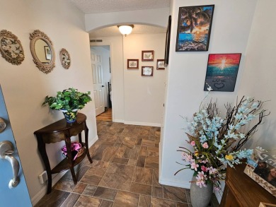 This lovely home is located in North Fort Myers Florida! Pine on Pine Lakes Country Club in Florida - for sale on GolfHomes.com, golf home, golf lot