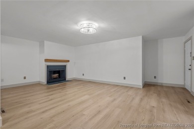 Don't miss this chance to own a charming and fully updated on The National Golf Club in North Carolina - for sale on GolfHomes.com, golf home, golf lot