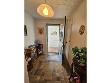 This lovely home is located in North Fort Myers Florida! Pine on Pine Lakes Country Club in Florida - for sale on GolfHomes.com, golf home, golf lot