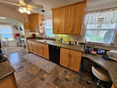 This lovely home is located in North Fort Myers Florida! Pine on Pine Lakes Country Club in Florida - for sale on GolfHomes.com, golf home, golf lot