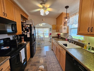 This lovely home is located in North Fort Myers Florida! Pine on Pine Lakes Country Club in Florida - for sale on GolfHomes.com, golf home, golf lot
